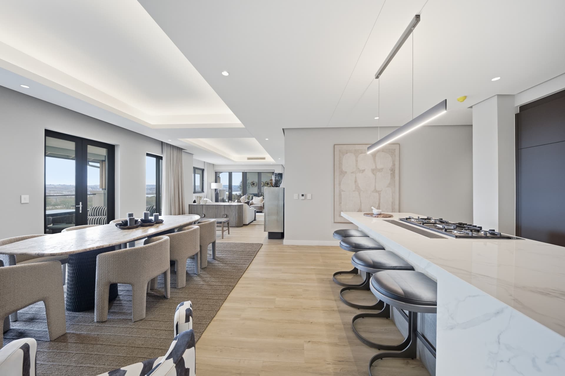 Kitchen and dining area in a four-bedroom apartment